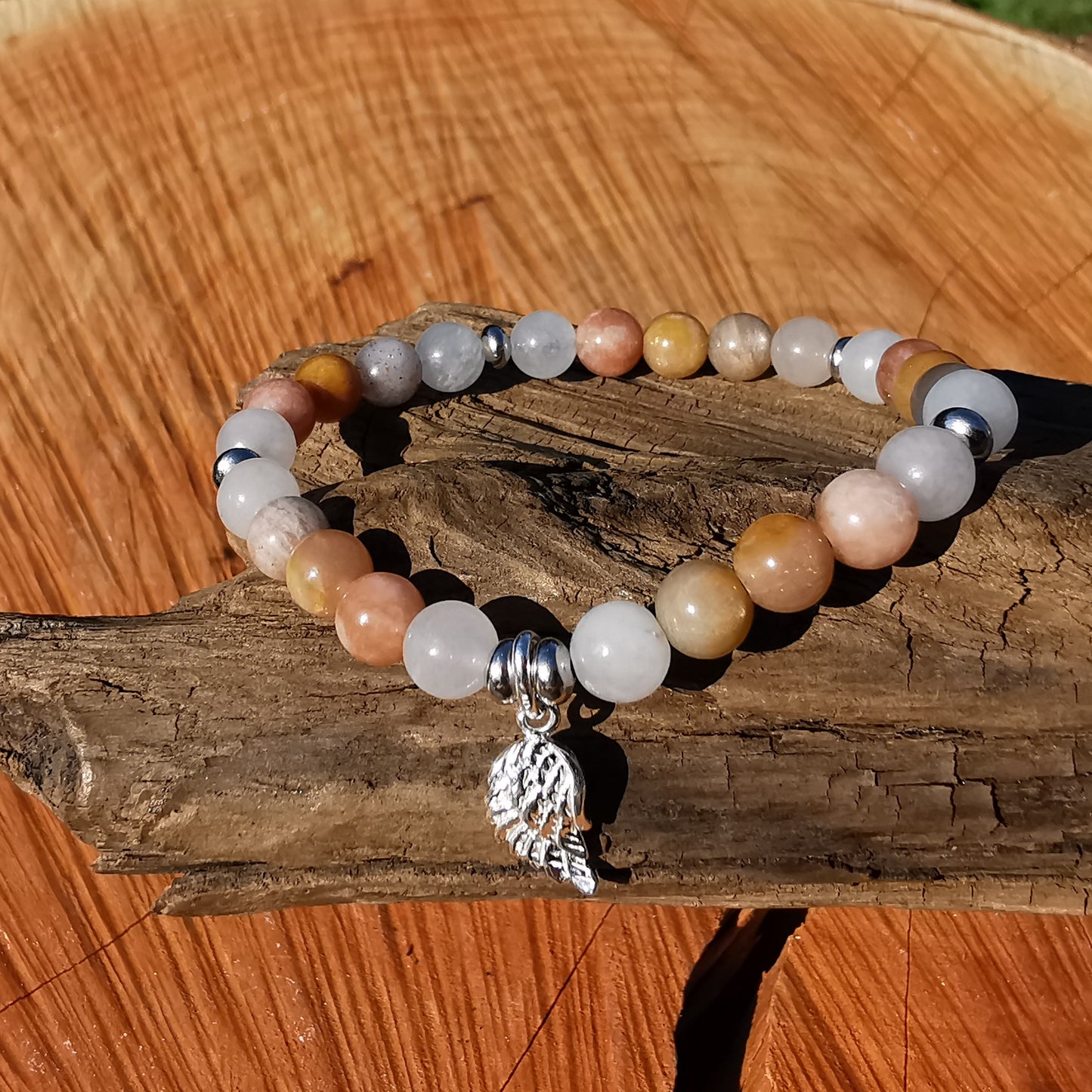 Heilstein Armband BEWUSST SEIN Mondstein Engelsflügel 6mm Kugeln