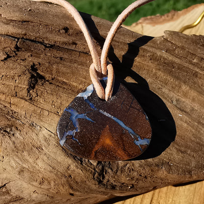 Boulder opal pendant drilled small including leather cord