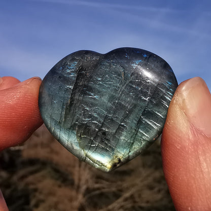 Apatite tumbled stone drilled including leather strap